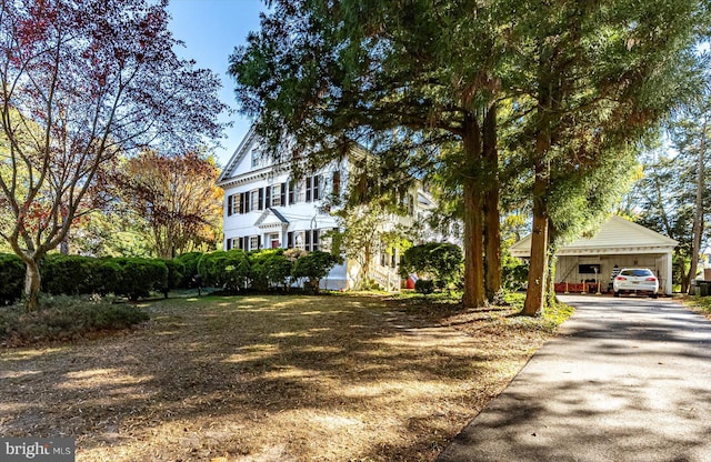 view of front of house featuring a carport