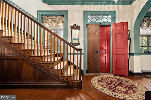 foyer entrance with dark hardwood / wood-style flooring