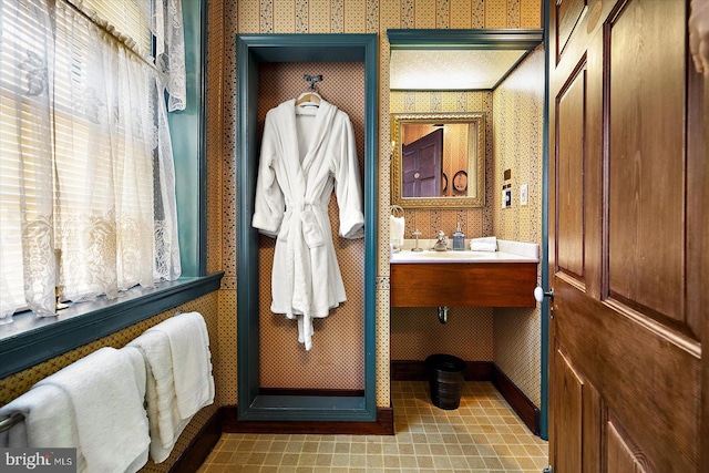 bathroom featuring tile patterned floors and sink