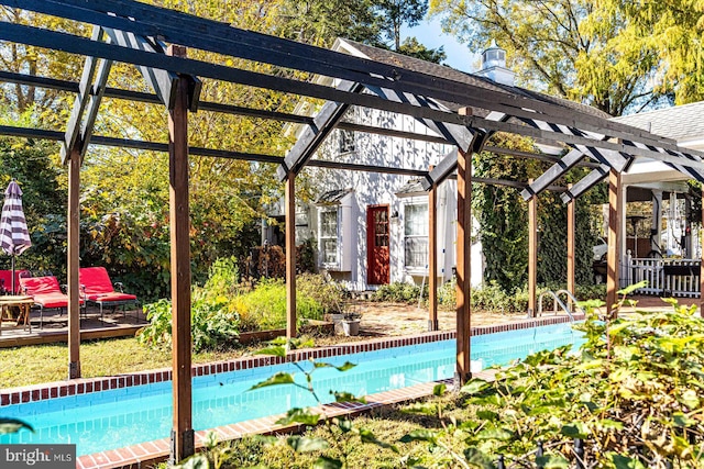 view of pool with a deck