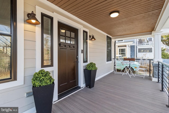 wooden deck with a porch