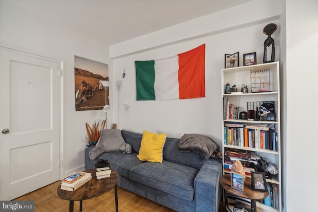 living room featuring parquet floors