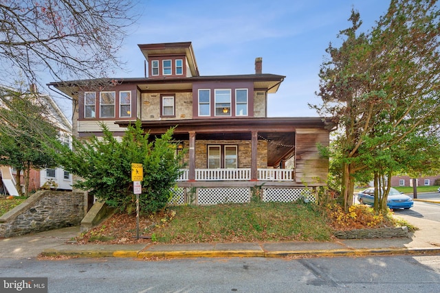 view of front of home with covered porch