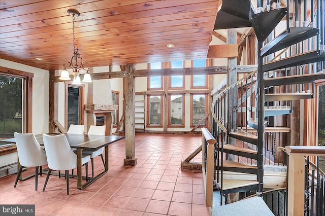 tiled dining room with wooden ceiling and a chandelier