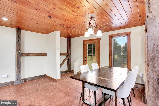 tiled dining room featuring wooden ceiling and an inviting chandelier