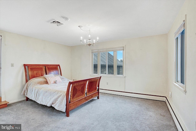 bedroom with carpet, a chandelier, and a baseboard heating unit