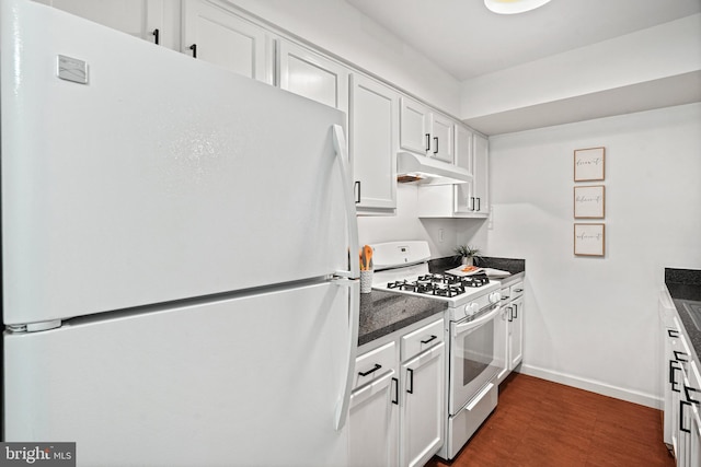 kitchen with white cabinetry and white appliances