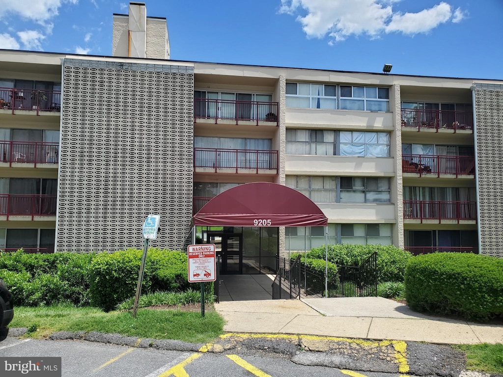 9205 New Hampshire Ave Unit A-1, Silver Spring, MD 20903 - view of apartment building / complex featuring uncovered parking
