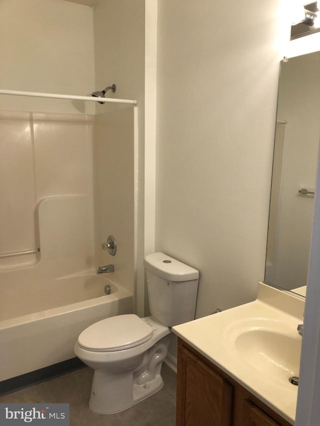 full bathroom with tile patterned floors, vanity, toilet, and shower / tub combination