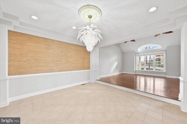 empty room with lofted ceiling with beams, baseboards, an inviting chandelier, and recessed lighting