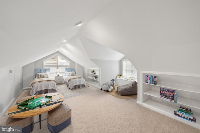 bedroom with baseboards, carpet flooring, visible vents, and vaulted ceiling