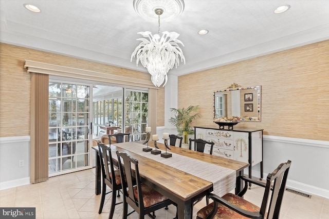dining space with a chandelier, light tile patterned floors, baseboards, visible vents, and recessed lighting