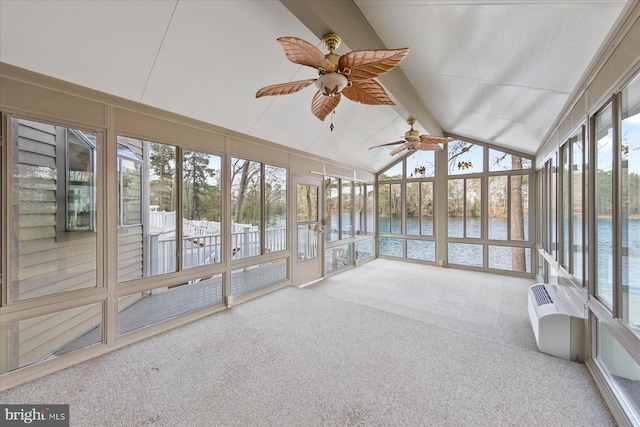 unfurnished sunroom with a water view, a ceiling fan, and beam ceiling