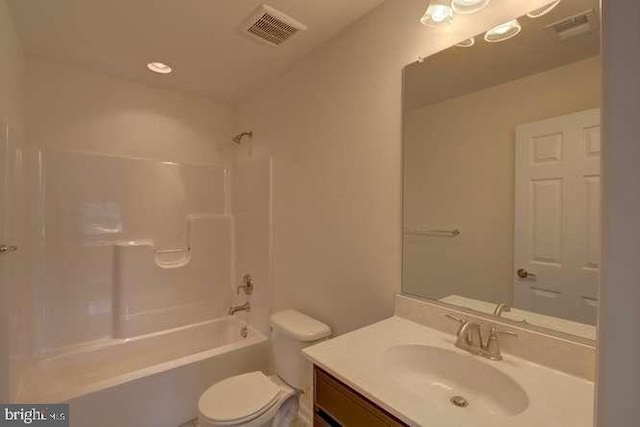 full bathroom featuring toilet, shower / washtub combination, and vanity