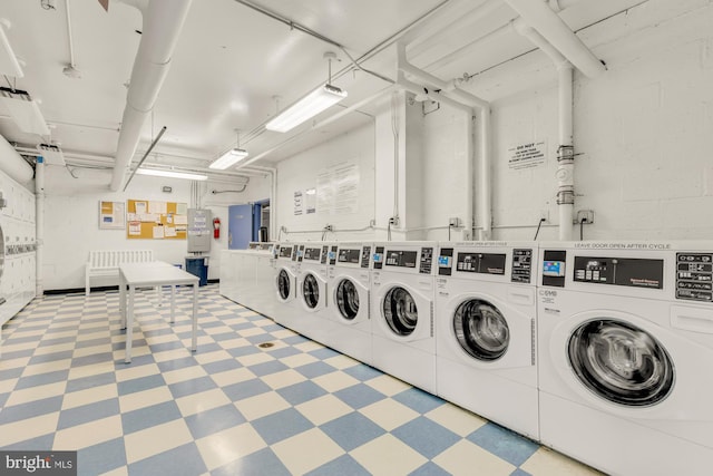 laundry room featuring washing machine and dryer