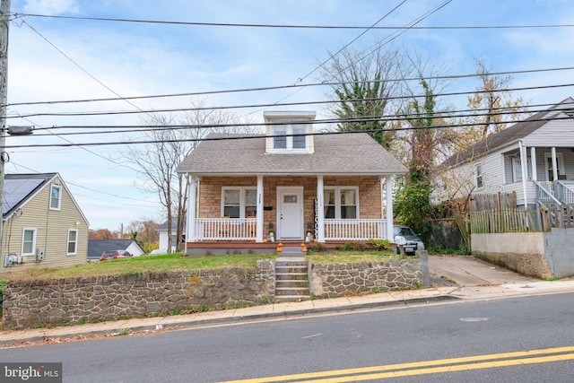 bungalow-style house featuring a porch