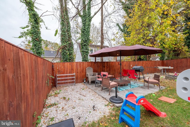 view of patio / terrace featuring an outdoor hangout area and grilling area