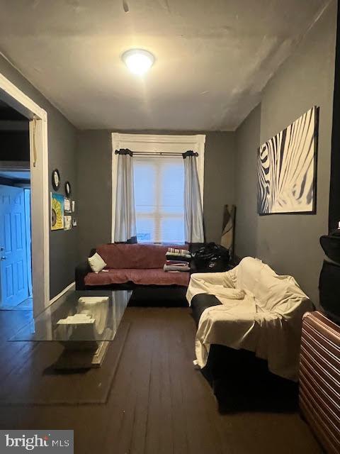 bedroom featuring hardwood / wood-style flooring