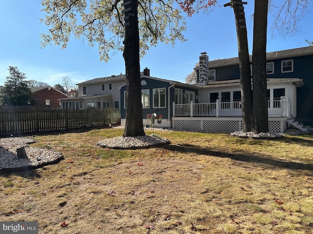 view of yard featuring a sunroom