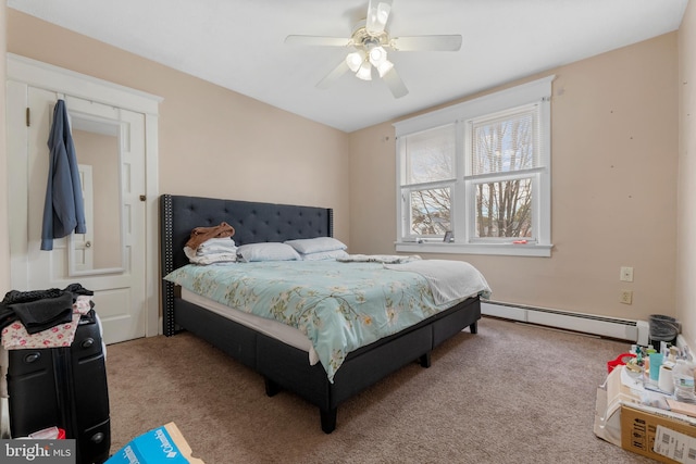 carpeted bedroom with a baseboard radiator and ceiling fan