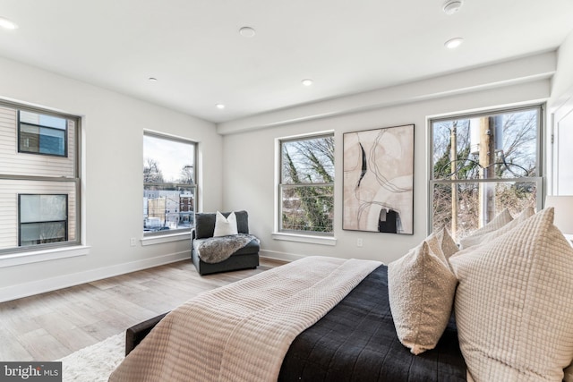 bedroom with light hardwood / wood-style floors