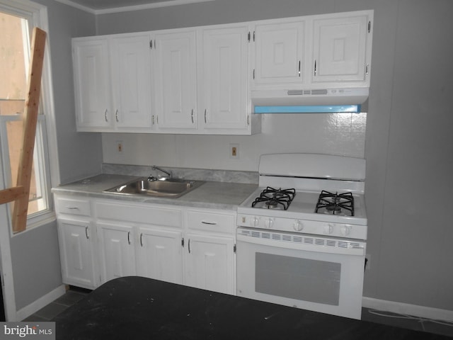 kitchen featuring exhaust hood, white cabinets, sink, white gas range oven, and ornamental molding