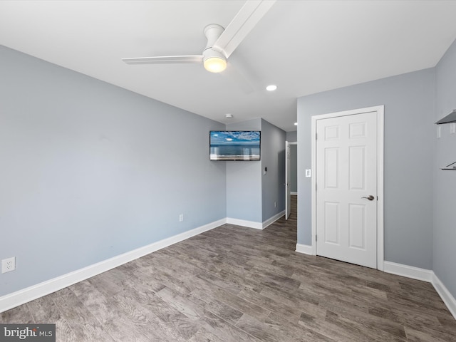 spare room featuring hardwood / wood-style floors