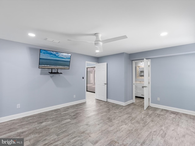 interior space featuring ceiling fan and light hardwood / wood-style floors