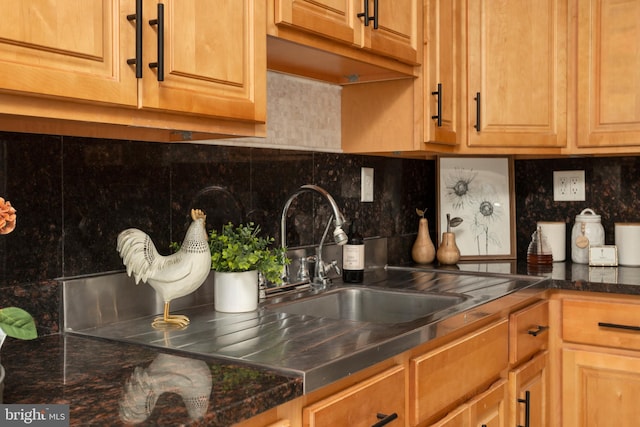 kitchen with decorative backsplash and sink