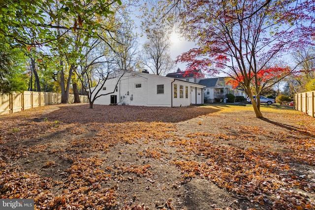 view of property exterior with central AC