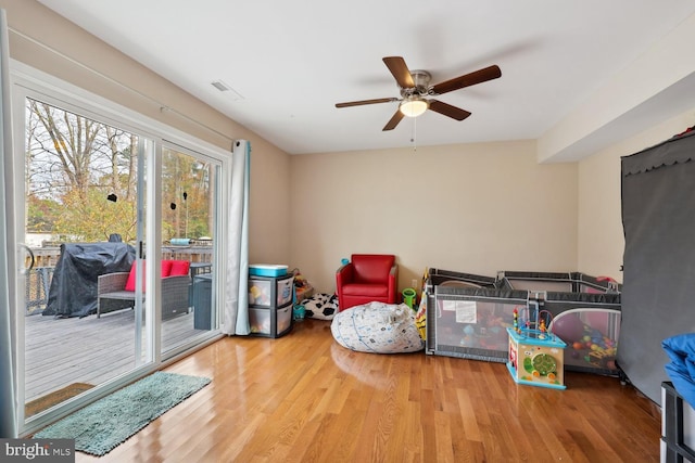 interior space featuring ceiling fan and hardwood / wood-style flooring