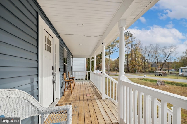 deck with covered porch