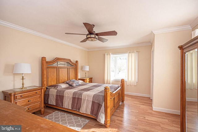 bedroom featuring light hardwood / wood-style floors, ceiling fan, and ornamental molding