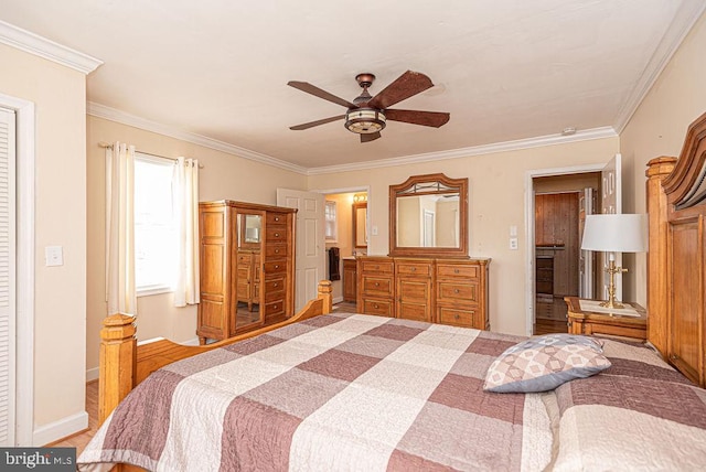 bedroom featuring ceiling fan, light hardwood / wood-style floors, and crown molding