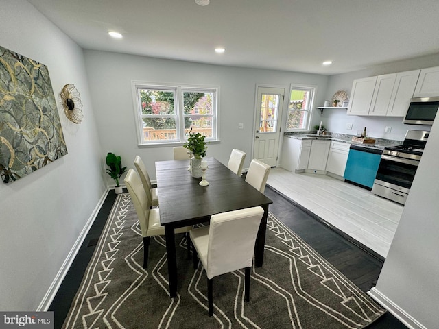 dining room featuring wood-type flooring