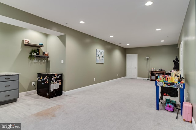 playroom featuring recessed lighting, light colored carpet, and baseboards