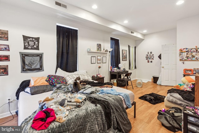 bedroom featuring hardwood / wood-style flooring