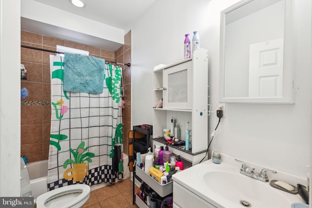 full bathroom featuring tile patterned flooring, vanity, shower / bath combination with curtain, and toilet