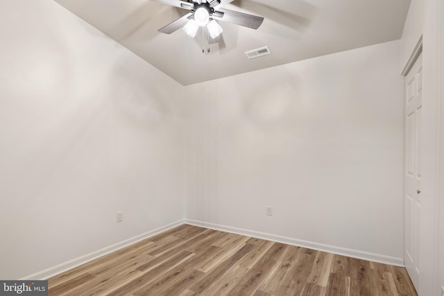 spare room featuring ceiling fan and light hardwood / wood-style floors