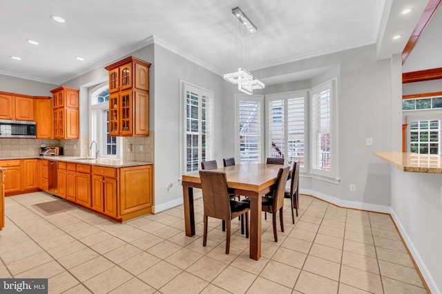 7238 Farr St, Annandale, VA 22003 - dining room featuring light tile patterned floors, a chandelier, baseboards, recessed lighting, and crown molding