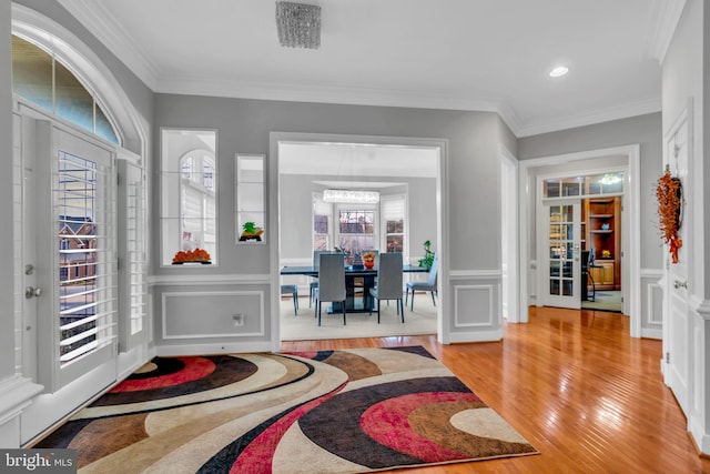 7238 Farr St, Annandale, VA 22003 - foyer with hardwood / wood-style floors, ornamental molding, a decorative wall, a wainscoted wall, and recessed lighting