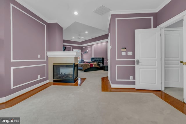 7238 Farr St, Annandale, VA 22003 - unfurnished bedroom with crown molding, a multi sided fireplace, wood finished floors, baseboards, and recessed lighting
