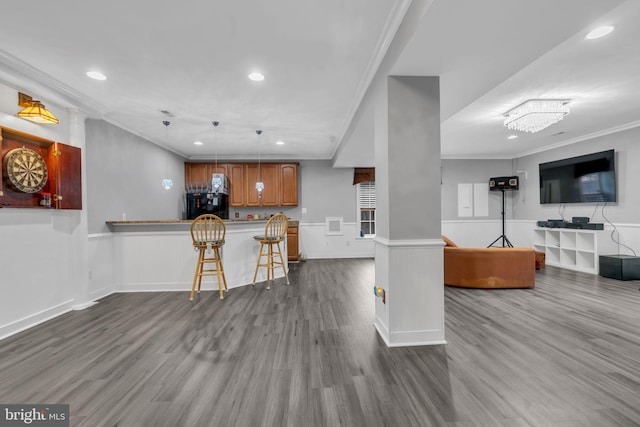 7238 Farr St, Annandale, VA 22003 - kitchen with black refrigerator, crown molding, open floor plan, dark wood-type flooring, and recessed lighting