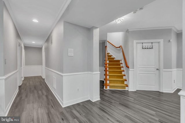 7238 Farr St, Annandale, VA 22003 - hall with wood finished floors, a wainscoted wall, stairs, crown molding, and recessed lighting