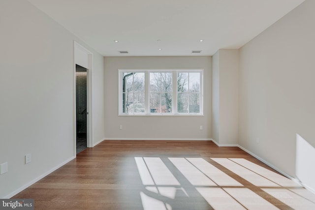 empty room featuring light hardwood / wood-style floors