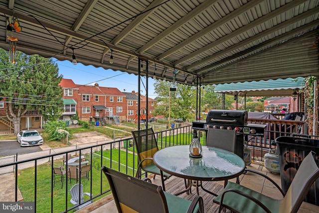 balcony featuring area for grilling