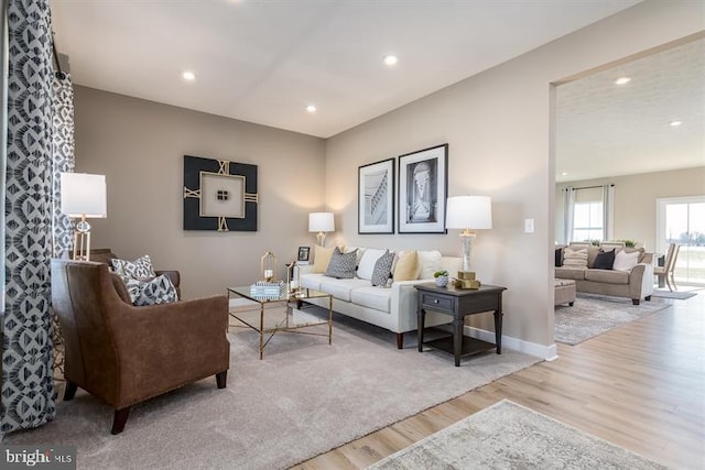 living room with light hardwood / wood-style floors