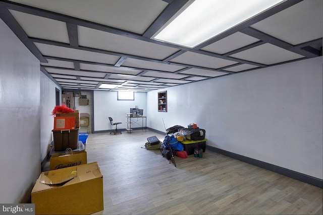 basement with wood-type flooring