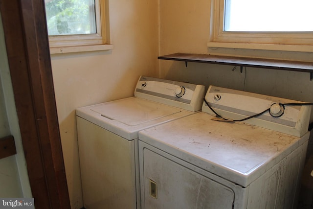 washroom featuring washer and clothes dryer