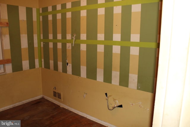 washroom with dark wood-type flooring